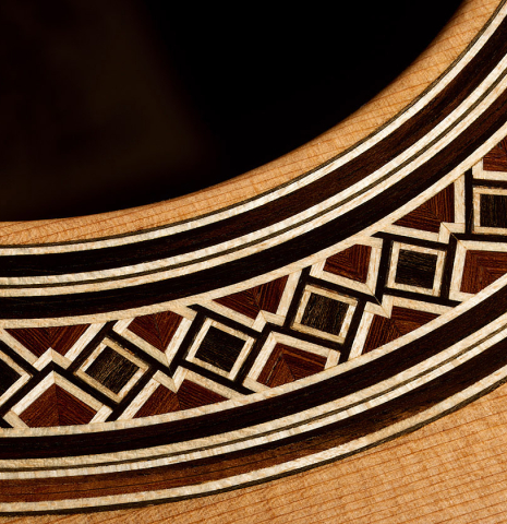 The soundboard and rosette of a 2026 Elias Bonet classical guitar made of cedar and African rosewood