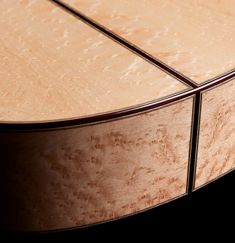 The back and sides at the foot of a 2024 Elias Bonet classical guitar made of spruce and maple