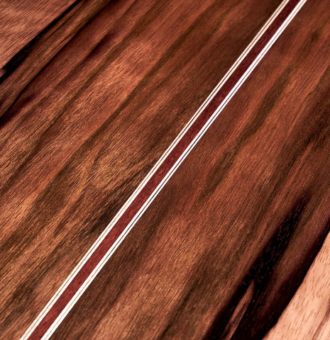 The back of a 2023 Elias Bonet "Aire" classical guitar made of cedar and Green ebony.