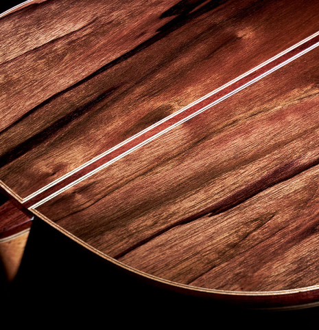 The back and heel of a 2023 Elias Bonet "Aire" classical guitar made of cedar and Green ebony.