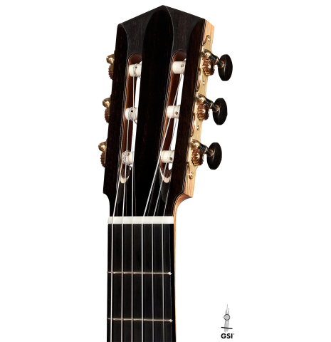 The headstock of a 2023 Elias Bonet "Aire" classical guitar made of cedar and Green ebony.