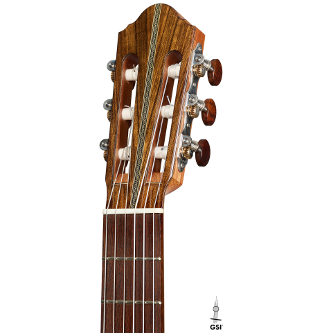 The headstock of a 2026 Eduardo Bossa classical guitar made of cedar and ovangkol