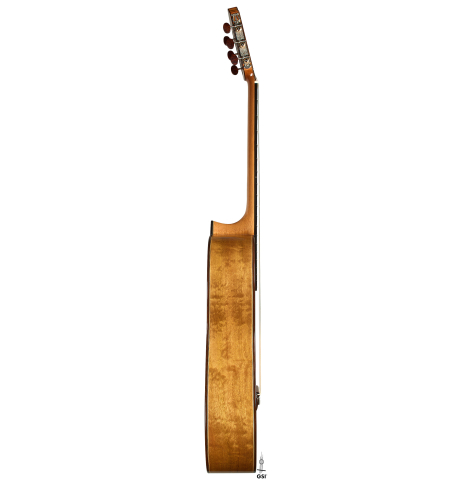 The side of a 2026 Eduardo Bossa classical guitar made of spruce and comino crespo