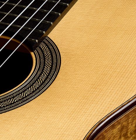 The soundboard and rosette of a 2026 Eduardo Bossa classical guitar made of spruce and comino crespo
