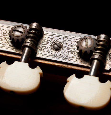 The tuning machines of a 1965 Robert Bouchet classical guitar made of spruce and CSA rosewood