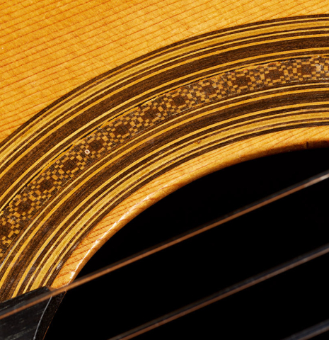 Closeup detail of the rosette of a 1965 Robert Bouchet classical guitar made of spruce and CSA rosewood