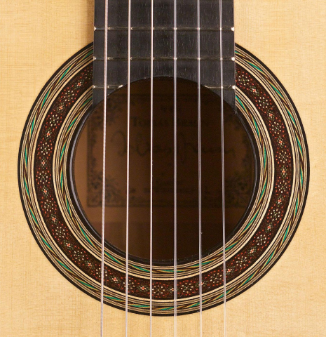 The rosette of the 2012 Tobias Braun classical guitar made with bearclaw German spruce and satinwood.