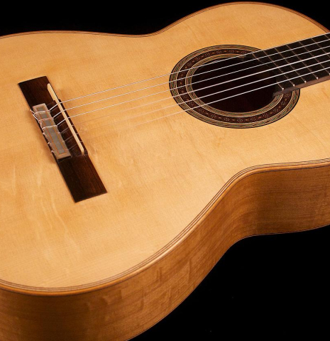 The top of the 2012 Tobias Braun classical guitar made with bearclaw German spruce and satinwood.