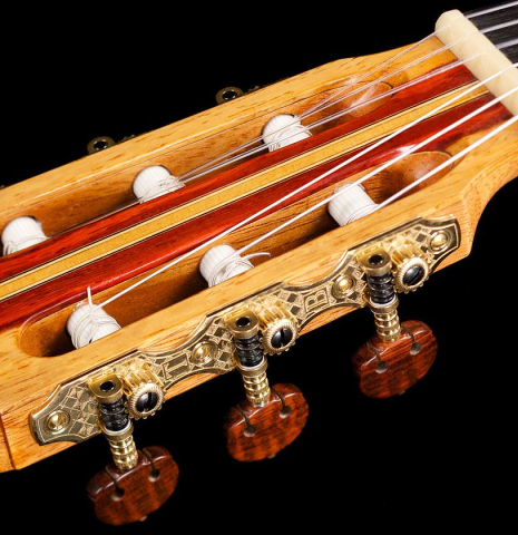 The headstock of the 2012 Tobias Braun classical guitar made with bearclaw German spruce and satinwood.