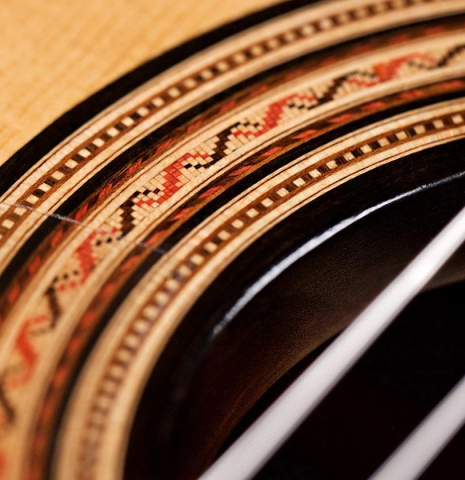Detail of the rosette and tornavoz of a 2004 Tobias Braun "1912 Ramirez" made of spruce and Indian rosewood