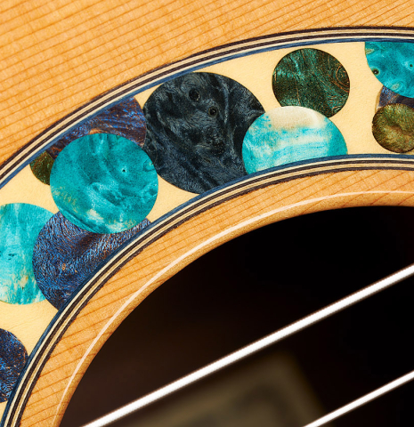 Close-up detail of the rosette of a 2019 Greg Brandt classical guitar made of cedar and CSA rosewood