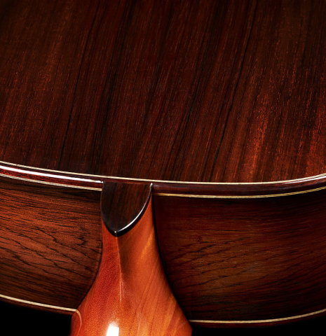 The heel and back binding of a 2019 Greg Brandt classical guitar made of cedar and CSA rosewood