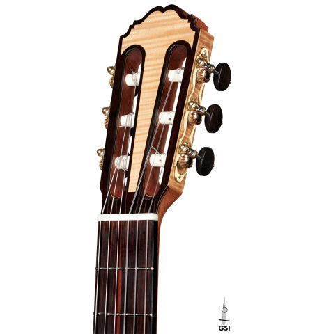 The headstock of a 2023 Kenneth Brogger classical guitar made of spruce and maple.