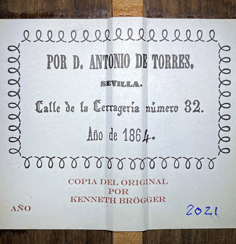 The label of a 2021 Kenneth Brogger "1864 Torres" classical guitar made of spruce and CSA rosewood