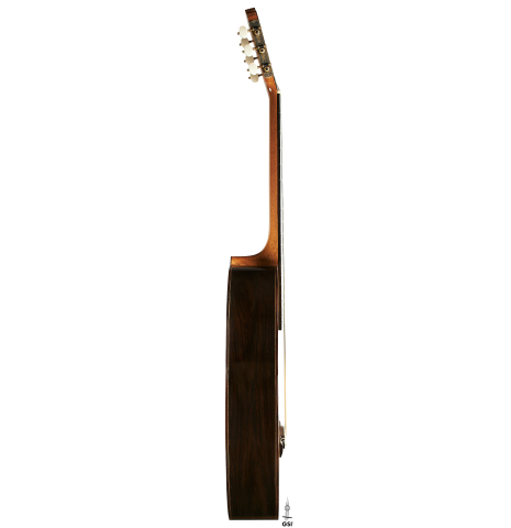 The side of a 2021 Kenneth Brogger "1864 Torres" classical guitar made of spruce and CSA rosewood