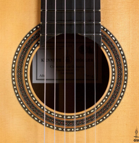 This is the rosette of a 2018 Kenneth Brogger "Stradivarius" classical guitar made with spruce and CSA rosewood