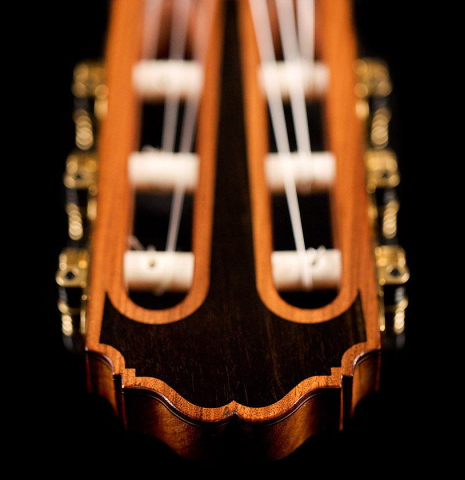 The headstock veneer and tuning machines of a 2020 Kenneth Brogger "Stradivarius" classical guitar made of spruce and CSA rosewood