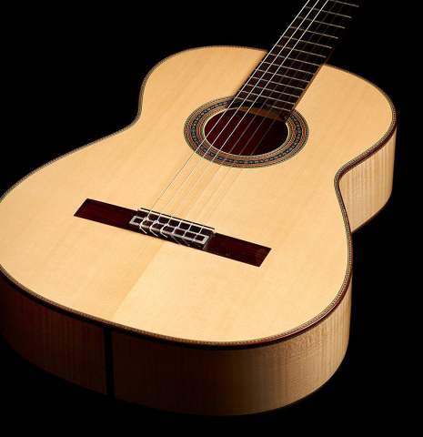 The front of a 2008 Kenneth Brogger classical guitar made of spruce and maple