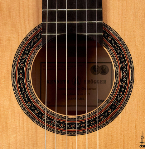 The rosette of a 2008 Kenneth Brogger classical guitar made of spruce and maple