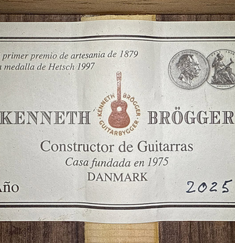 The label of a 2025 Kenneth Brogger "Mosaic" classical guitar made of spruce and Indian rosewood
