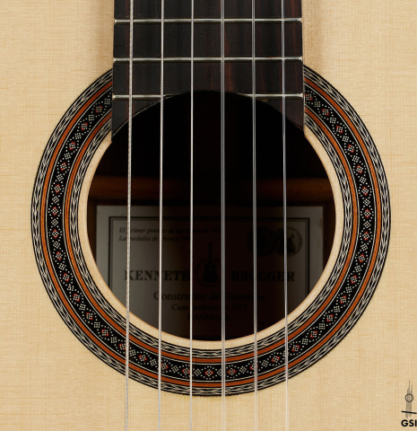 The rosette of a 2025 Kenneth Brogger "Mosaic" classical guitar made of spruce and Indian rosewood