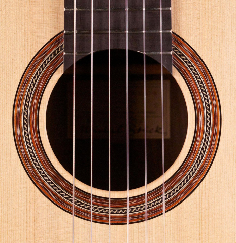 The rosette of a 2007 Michel Bruck classical guitar made of spruce and CSA rosewood