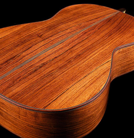 The back and sides of a 2007 Michel Bruck classical guitar made of spruce and CSA rosewood