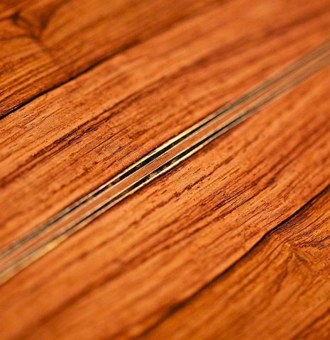 Detail of the back center seam of a 2007 Michel Bruck classical guitar made of spruce and CSA rosewood