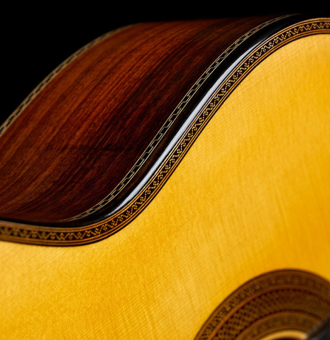 The top and side of a 2023 Ivan Bruna "Limited Edition" classical guitar made of spruce and Indian rosewood