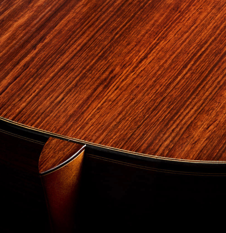 The heel, back binding and purfling of a 2025 Ivan Bruna classical guitar made of spruce and Indian rosewood