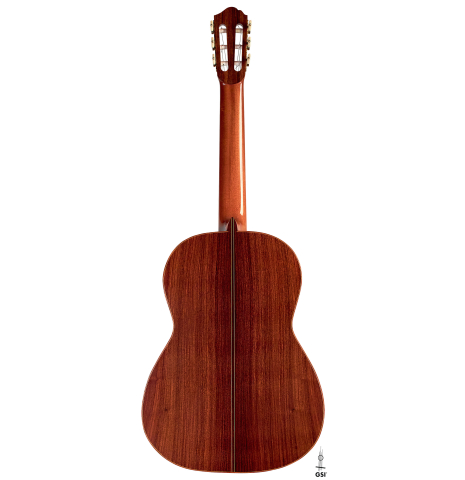 This is the back of a 1984 Cynthia H. Burton CD/IN classical guitar on a white background