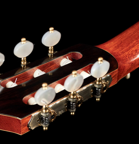 This is a close-up of the back head veneer and Rodgers tuning machines of a 1986 Cynthia H. Burton SP/MH classical guitar