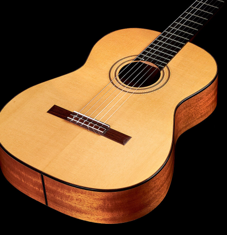 This is the cedar top front of a 1986 Cynthia H. Burton SP/MH classical guitar