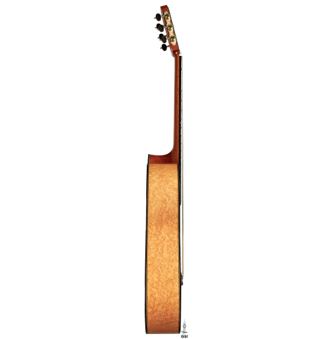 The side of a 2012 Geza Burghardt &quot;1943 Hauser&quot; classical guitar made with spruce and maple.