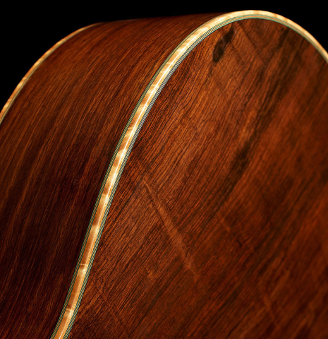 The back, sides and binding of a 2002 Geza Burghardt "Grand Concert - dedicated to JL Romanillos" classical guitar made of spruce and CSA rosewood
