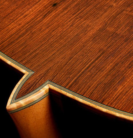 The heel, backing binding and purflings of a 2002 Geza Burghardt "Grand Concert - dedicated to JL Romanillos" classical guitar made of spruce and CSA rosewood