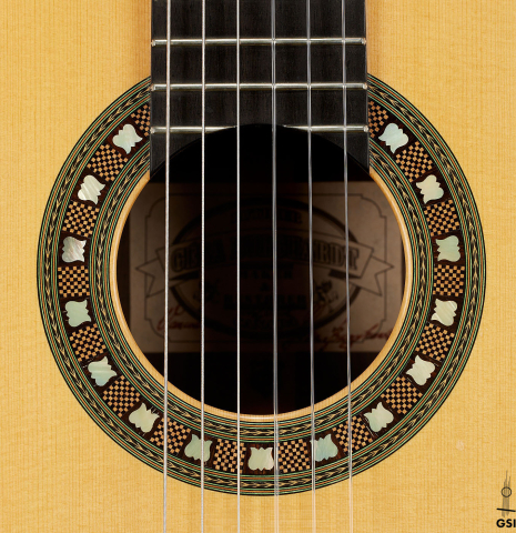 The rosette of a 2002 Geza Burghardt "Grand Concert - dedicated to JL Romanillos" classical guitar made of spruce and CSA rosewood