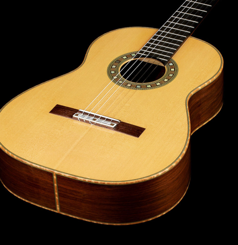 The soundboard of a 2002 Geza Burghardt "Grand Concert - dedicated to JL Romanillos" classical guitar made of spruce and CSA rosewood