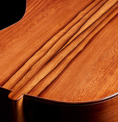 The heel, back binding and purlfing of a 2025 Carlos Juan Busquiel classical guitar made with cedar and African rosewood