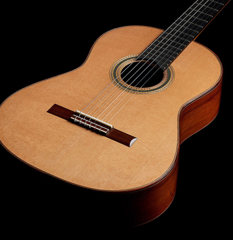 The soundboard and sides of a 2025 Carlos Juan Busquiel classical guitar made with cedar and African rosewood