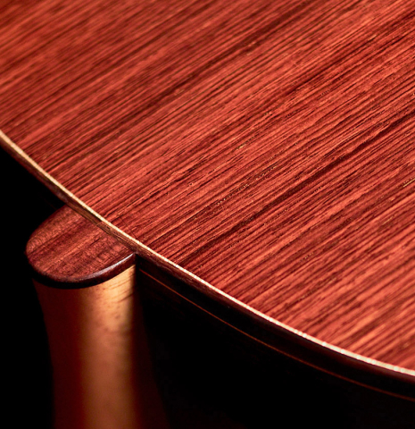 The heel of a 2022 Carlos Juan Busquiel classical guitar made with spruce and CSA rosewood.