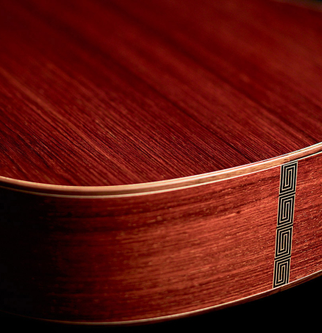 The back, binding and sides of a 2022 Carlos Juan Busquiel classical guitar made with spruce and CSA rosewood.