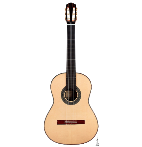The front of a 2022 Carlos Juan Busquiel classical guitar made with spruce and CSA rosewood shown on a white background