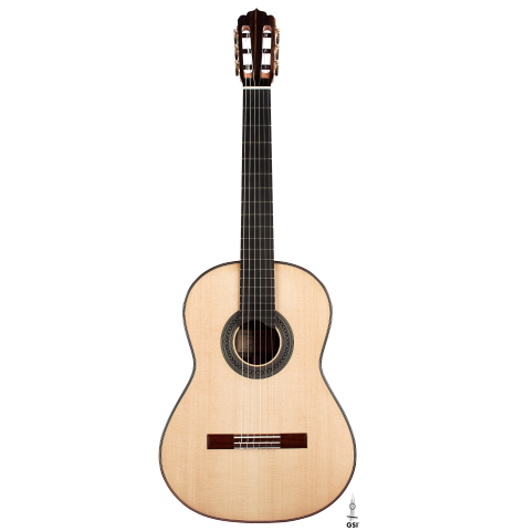 The front of a 2023 Carlos Juan Busquiel classical guitar made with spruce and CSA rosewood shown on a white background