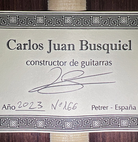 The label of a 2023 Carlos Juan Busquiel classical guitar made with spruce and CSA rosewood