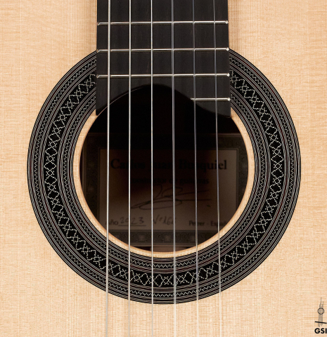The rosette of a 2023 Carlos Juan Busquiel classical guitar made with spruce and CSA rosewood