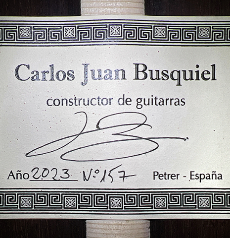 The label of a 2023 Carlos Juan Busquiel classical guitar made with cedar and CSA rosewood