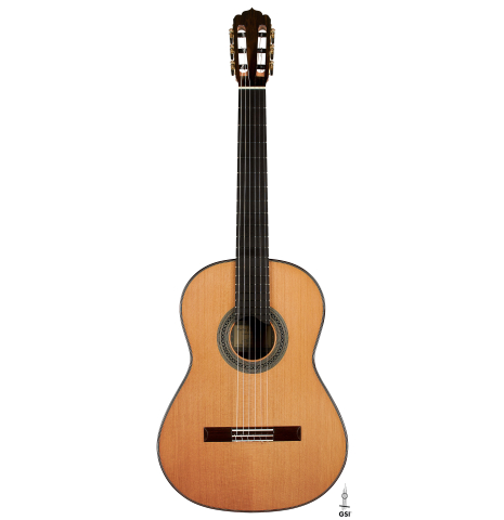 The front of a 2024 Carlos Juan Busquiel classical guitar made with cedar and CSA rosewood shown on a white background