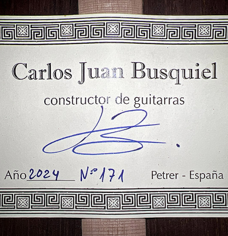 The label of a 2024 Carlos Juan Busquiel classical guitar made with cedar and CSA rosewood