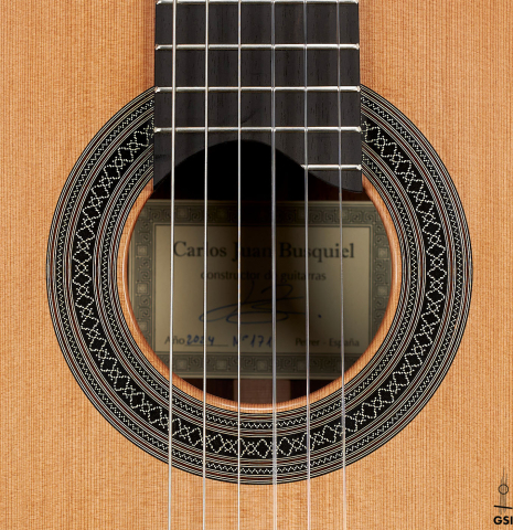 The rosette of a 2024 Carlos Juan Busquiel classical guitar made with cedar and CSA rosewood